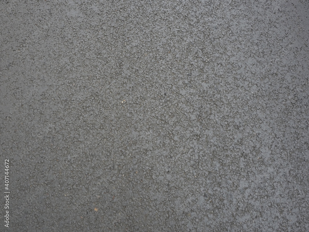 Fototapeta premium Dark gray new asphalt pavement. Texture not seamless. Closeup photo