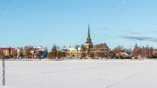 snow covered frozen lake in Swedish town of Mora in winter