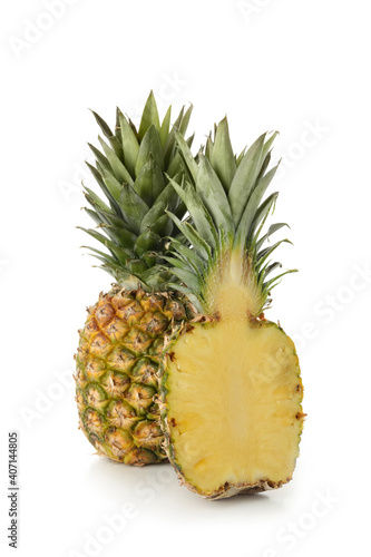 Tasty ripe pineapples isolated on white background