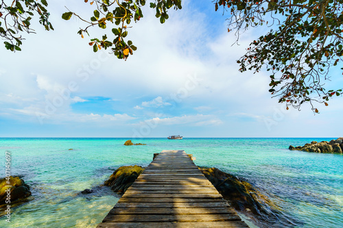 wooden bridge and sea beach with sky at Koh MunNork Island, Rayong, Thailand photo