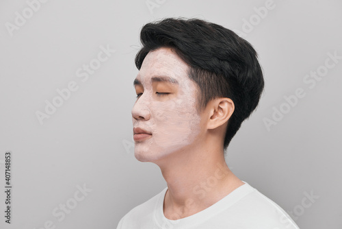Cosmetology man portrait with mud healthy scrub