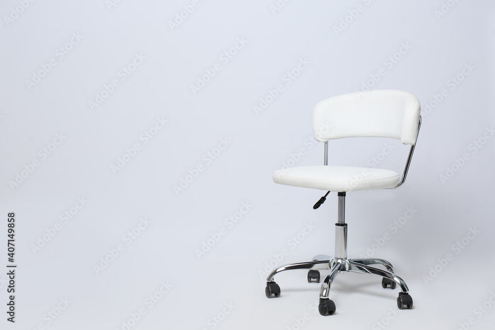 Comfortable office chair on white background, space for text Comfortable office chair on white background, space for text