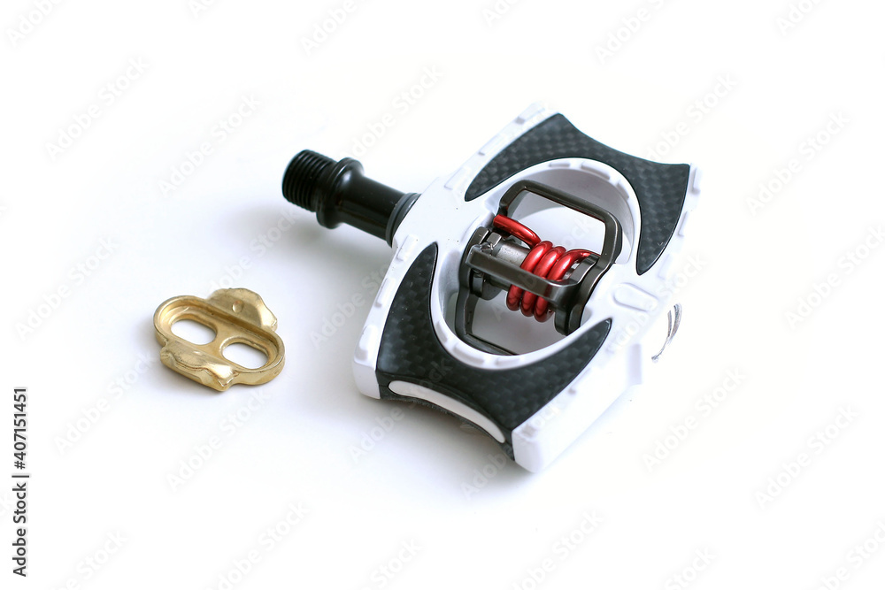 Modern bicycle pedals in different styles with clips isolated on white background. Modern bicycle pedals in different styles with clips isolated on white background.