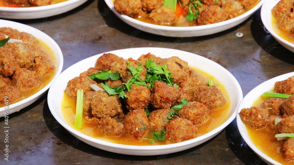 Steamed meatballs on the chopping board, homemade gourmet food Steamed meatballs on the chopping board, homemade gourmet food