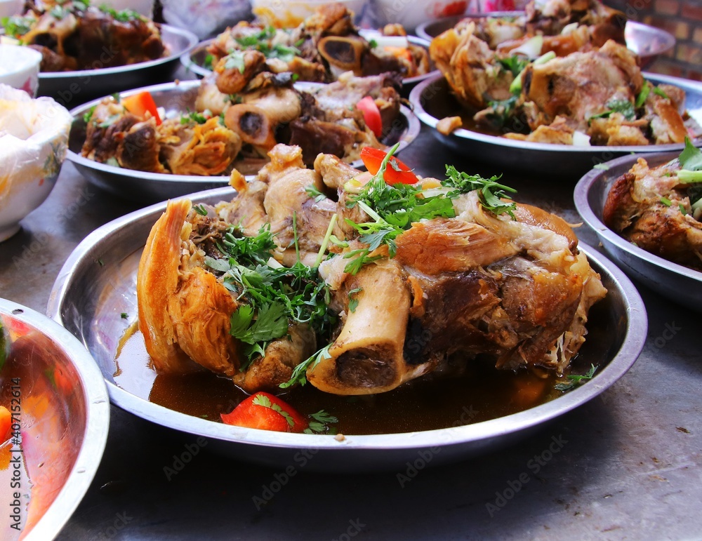 Chinese food, cooked meat on the chopping board, homemade traditional food Chinese food, cooked meat on the chopping board, homemade traditional food