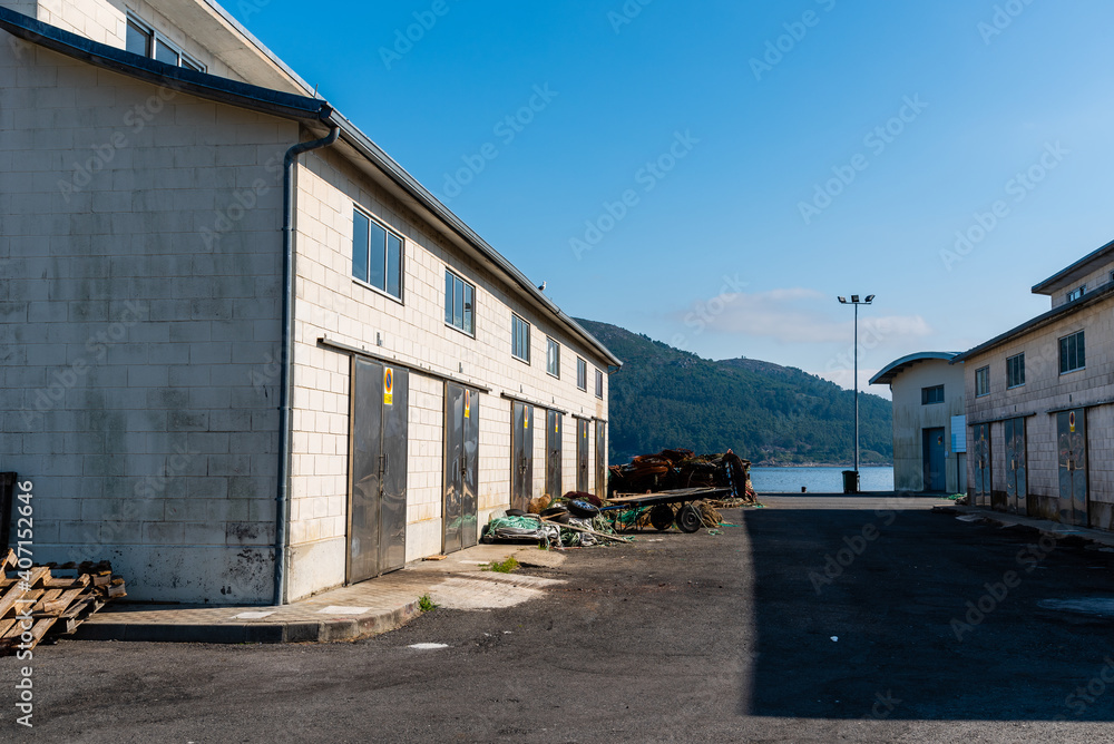 Old warehouses for fishermen in a port. Muros, Galicia, Spain