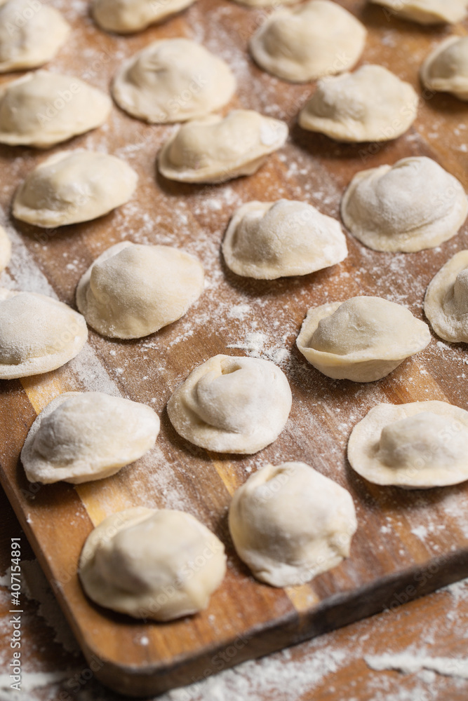 Dumplings making process, dough and minced meat Dumplings making process, dough and minced meat
