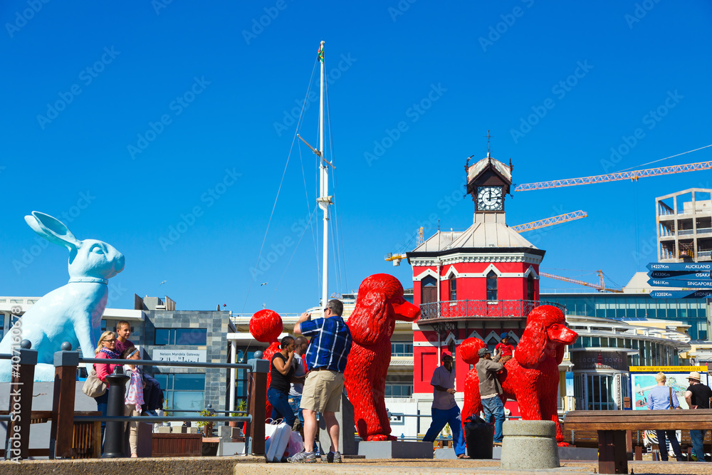 Naklejka premium Huge red statues of poodles