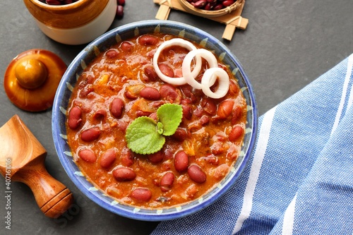 Rajma curry is a popular North Indian Food. Rajma is a socked Red kidney beans cooked with onions, tomatoes and a special blend of spices. Served with Jeera rice or Cumin Rice. With Copy Space. photo