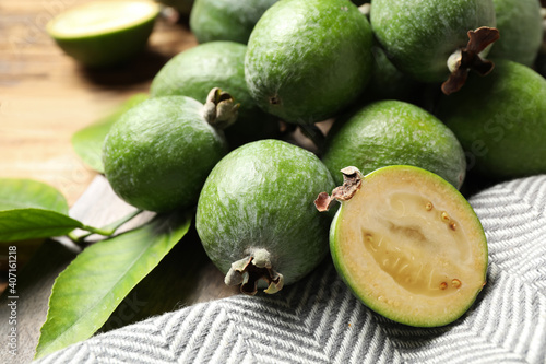 Fototapeta Naklejka Na Ścianę i Meble -  Composition with fresh green feijoa fruits on table, closeup