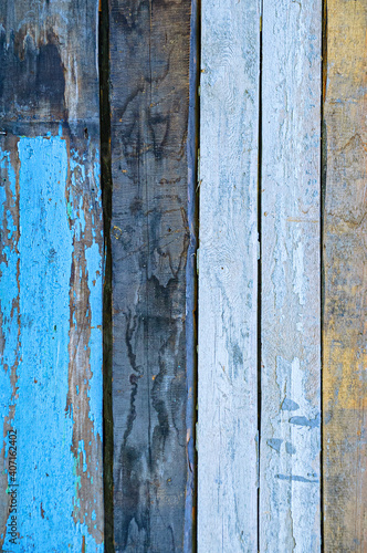 Vertical texture old painted wooden boards close-up.