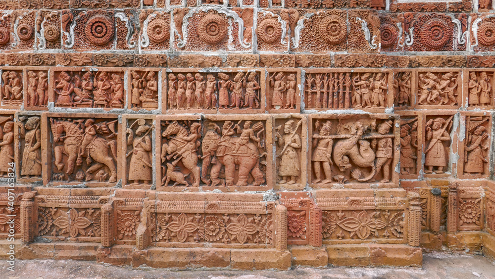Beautiful terracotta carving scenes of Ramayana (top) and hunting party (bottom) at Kantaji aka Kantajew medieval hindu temple, Kantanagar, Dinajpur, Bangladesh Beautiful terracotta carving scenes of Ramayana (top) and hunting party (bottom) at Kantaji aka Kantajew medieval hindu temple, Kantanagar, Dinajpur, Bangladesh