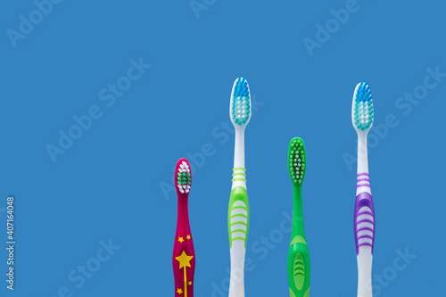 Family concept using adult and children toothbrushes