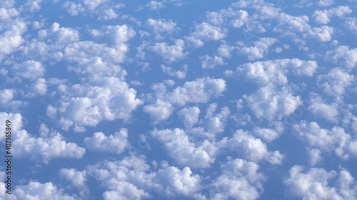 Tableau sur toile Flying over the white clouds. The view from the airplane window.