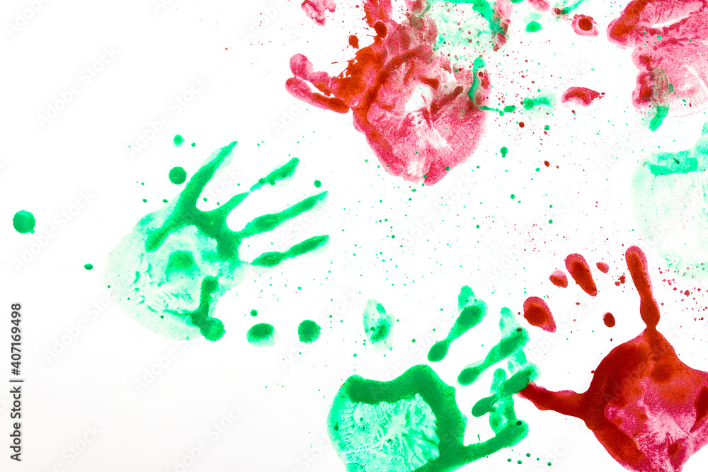 Multiple colored hand prints on a white background. Multiple colored hand prints on a white background.