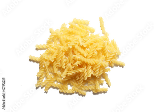 Heap Fusilli Pasta isolated on white background. Pasta is a staple food of traditional Italian cuisine.