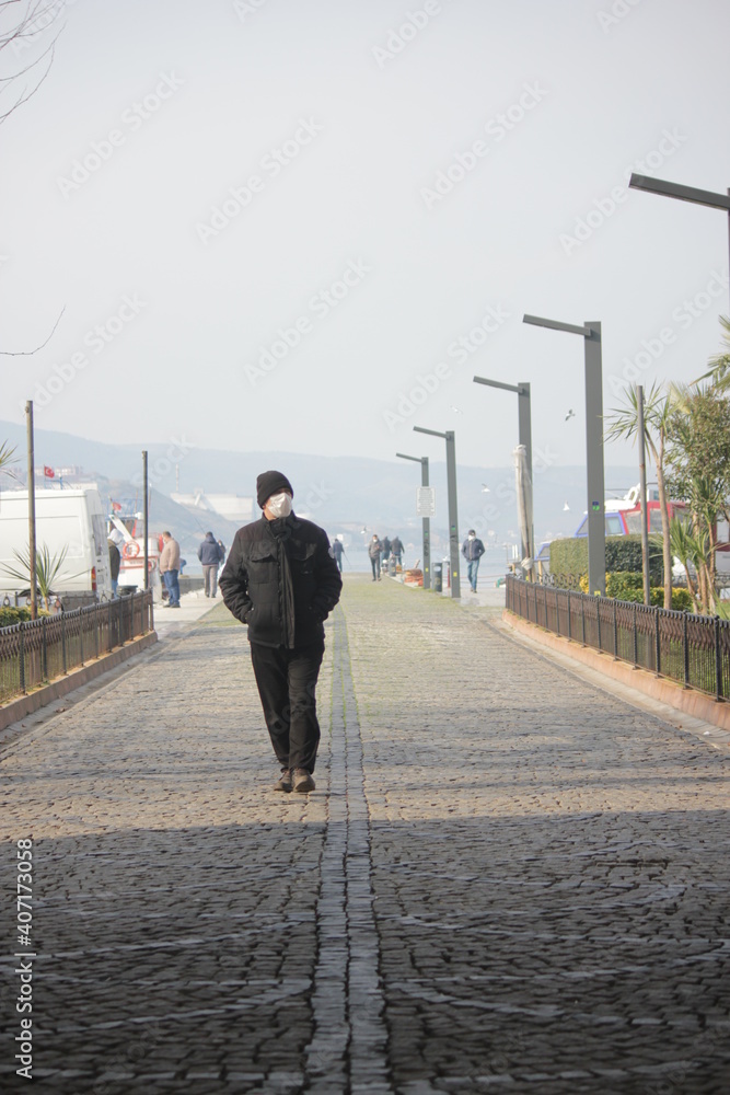man walking on the street