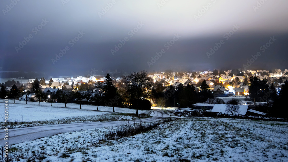 cold winter village at night