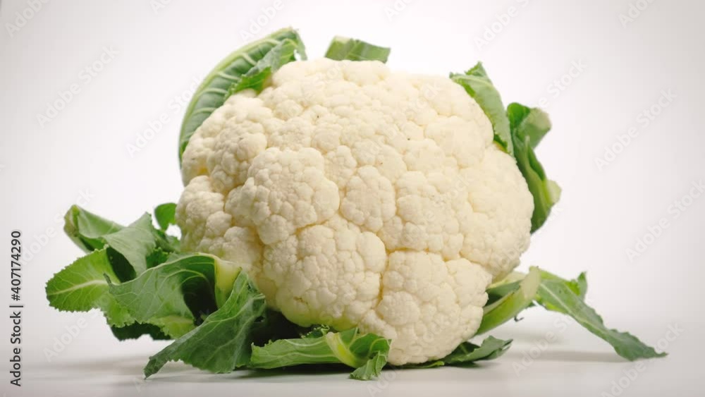 Single Cauliflower Isolated On White Surface Single Cauliflower Isolated On White Surface
