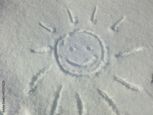 The sun with a smile in the snow