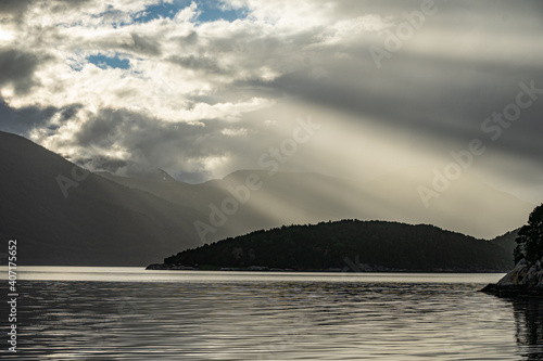 Sunbeam at Tingvollfjorden in Norway photo