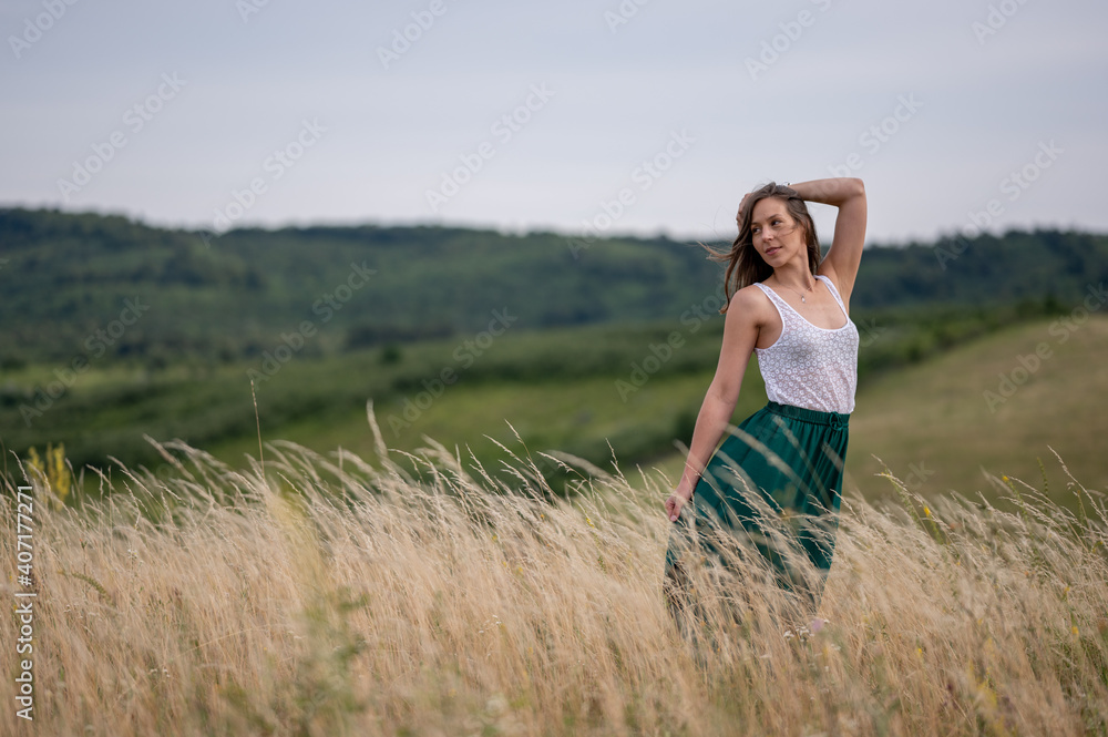 Beautiful woman enjoy wild flower field in summer Beautiful woman enjoy wild flower field in summer