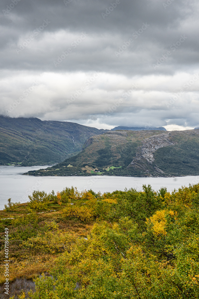 Fototapeta premium Fjord landscape with extrem weather conditions