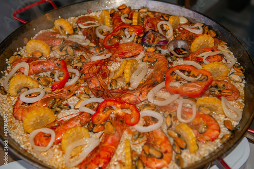 Delicious paella with seafood of shrimp, squid and mussels with vegetables