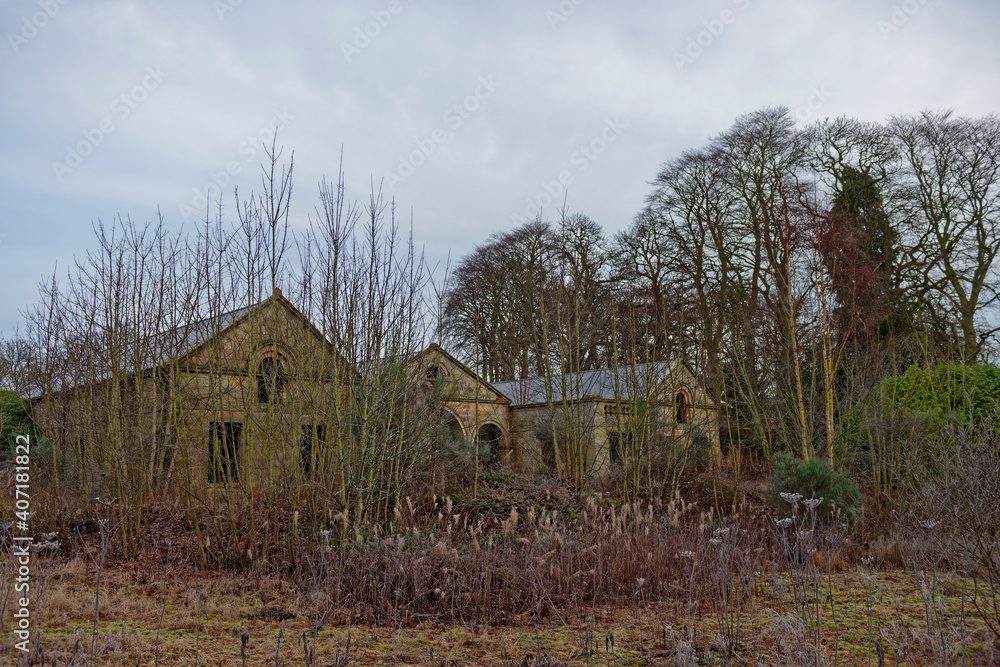 A derelict and abandoned Old Coach House hidden in the undergrowth on a disused Golf Course in the North East of Scotland near to Arbroath.