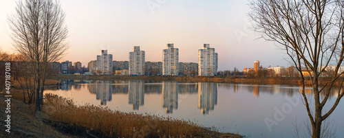 Beautiful view of evening Gomel with reflection in the lake