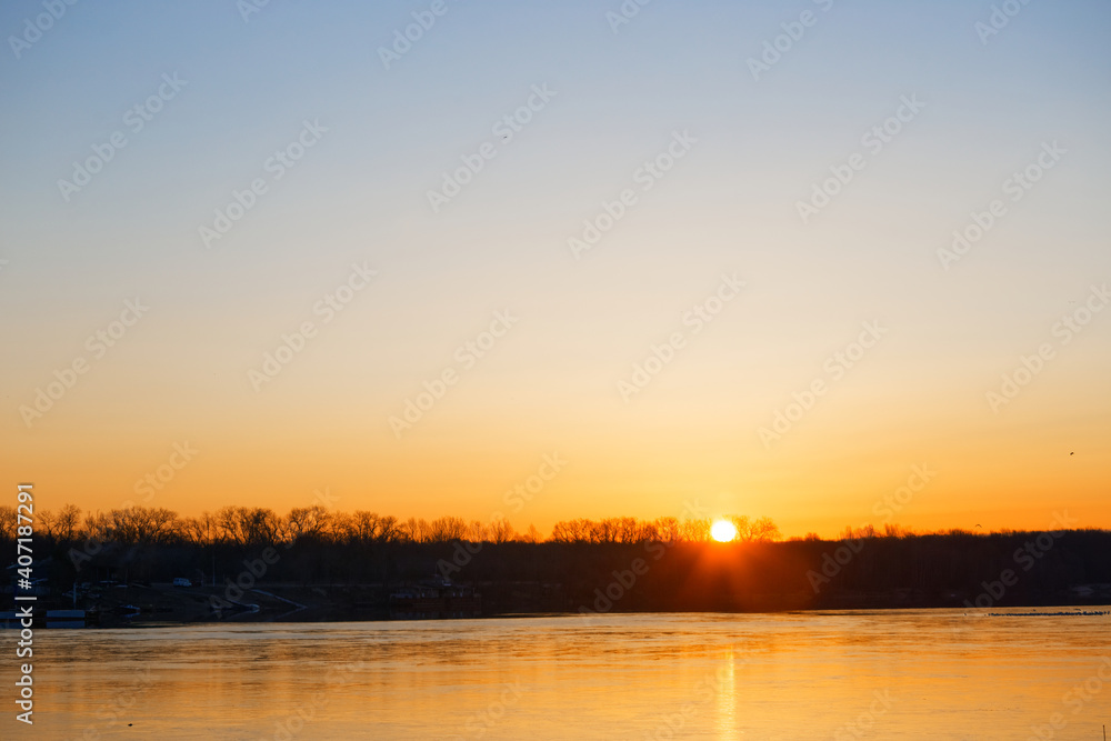 Beautiful landscape with old willow tree at sunrise. River Beautiful landscape with old willow tree at sunrise. River