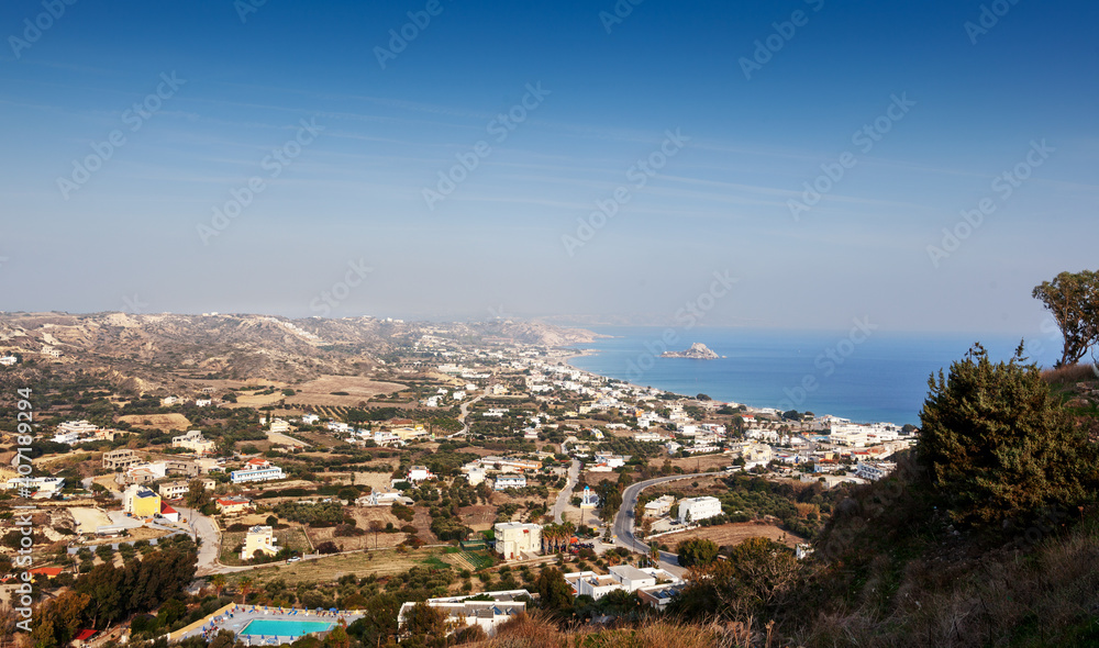 Bright beautiful landscape, view of the bay and the city of Kefalos, Kos island, Greece, a popular destination,