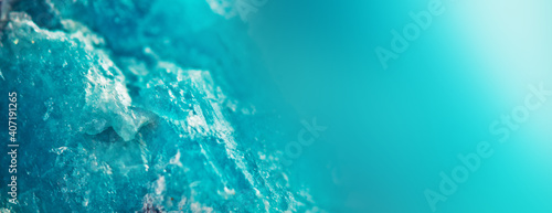Abstract turquoise crystal background. Banner format. Macro