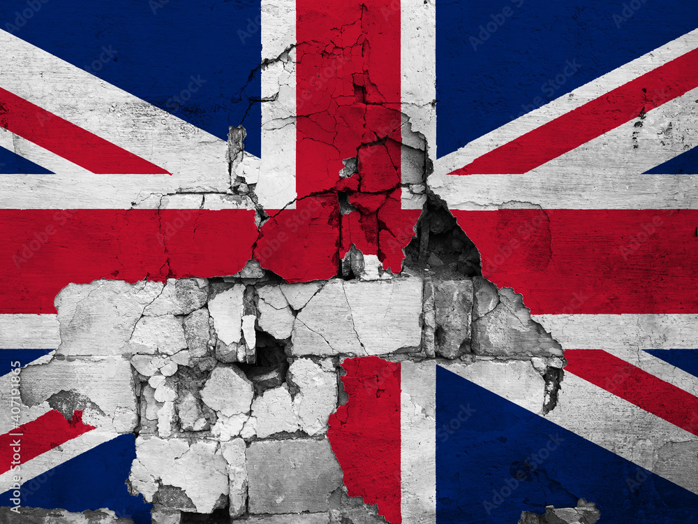 Flag of the United Kingdom painted on a broken wall.