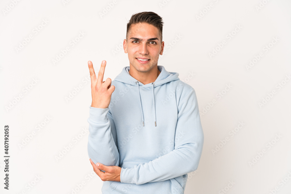 Young caucasian handsome man isolated showing number two with fingers. Young caucasian handsome man isolated showing number two with fingers.