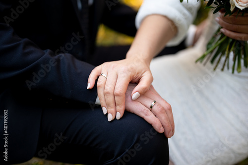 Hands of newlyweds - wedding - rings and hands 