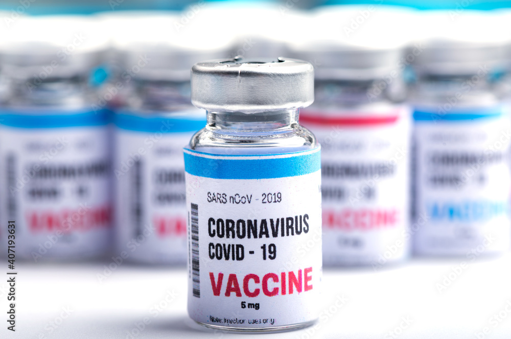 virus vaccine development of a coronavirus COVID-19, vaccine bottle in concept of insurance and fight against coronavirus 2019 ncov cure, medical research in laboratory to stop the spread of the virus virus vaccine development of a coronavirus COVID-19, vaccine bottle in concept of insurance and fight against coronavirus 2019 ncov cure, medical research in laboratory to stop the spread of the virus