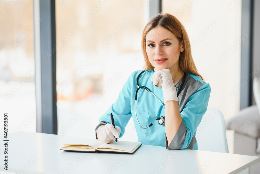Portrait of beautiful female doctor looking at camera.Beautiful female doctor Portrait of beautiful female doctor looking at camera.Beautiful female doctor
