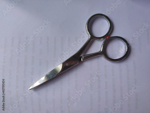 a steel scissors in a white backgorund