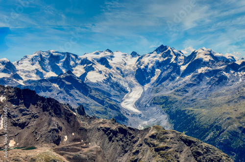  view of the great morteratsch glacier in engadin from piz languard. Swiss alpine landscape. Big mountains: Piz Bernina, Piz Palü