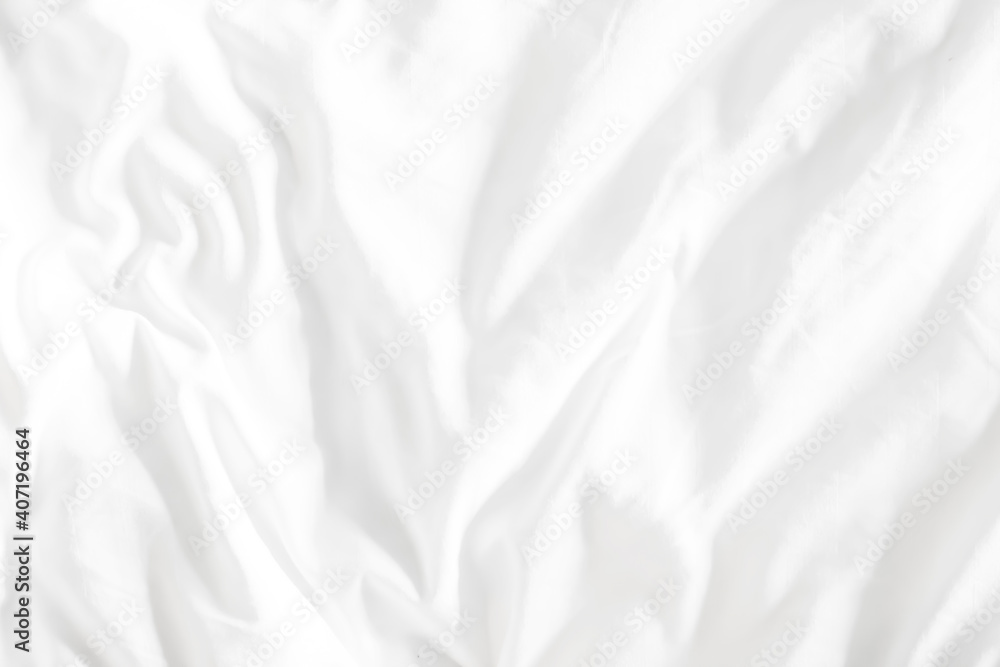 Obraz premium White bed linen background with copy space.
