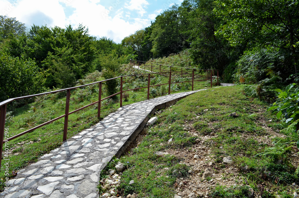 pedestrian path made of stones in the natural park Martvili Canyon