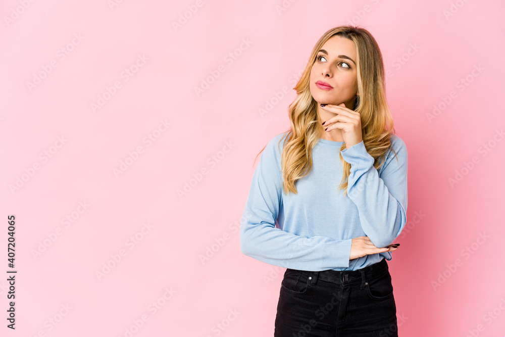 Young caucasian blonde woman throwing a punch, anger, fighting due to an argument, boxing. Young caucasian blonde woman throwing a punch, anger, fighting due to an argument, boxing.