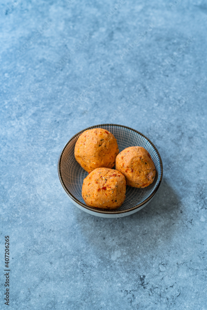 Traditional Turkish Spicy Surk Cheese Balls from Hatay in Turkey. Shanklish Orange Color. Traditional Turkish Spicy Surk Cheese Balls from Hatay in Turkey. Shanklish Orange Color.