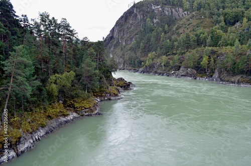 Beautiful natural places, picturesque mountains, gorges, turbulent river, active tourism.