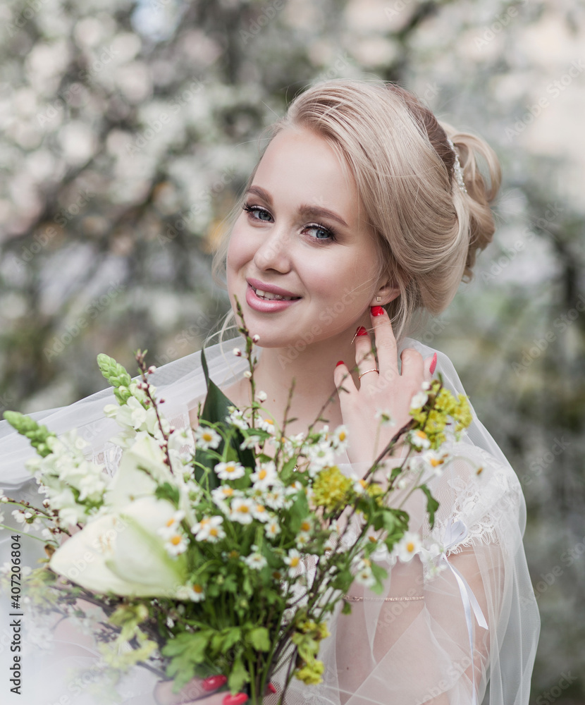 Fototapeta premium Stunning young bride with a bouquet