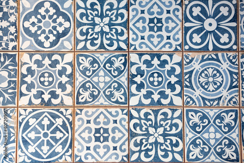 detail of a blue mosaic of a mosque
