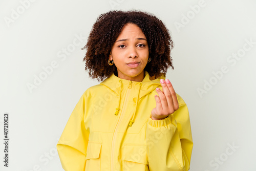 Young african american mixed race woman isolated showing that she has no money.
