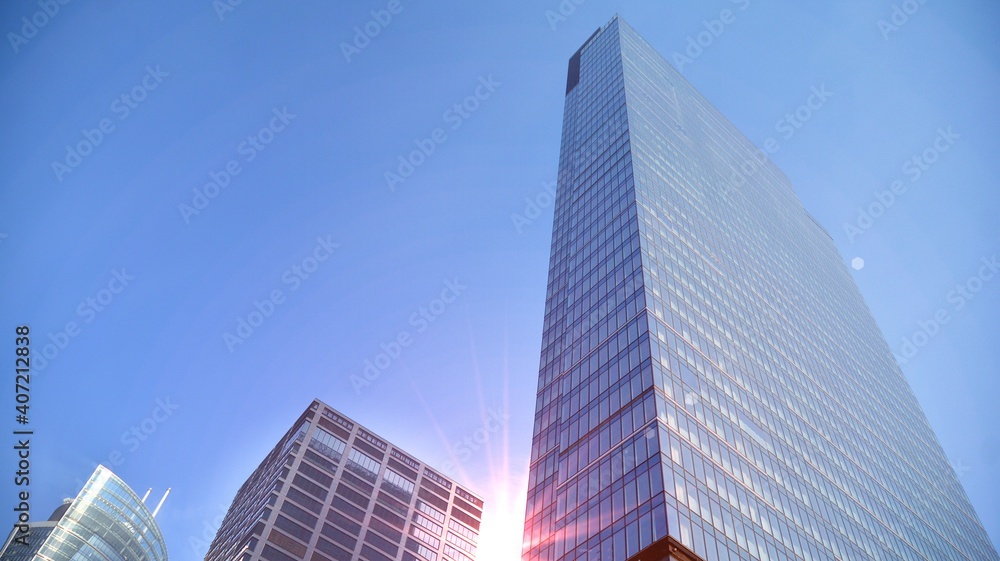 Concept for real estate and corporate construction..The modern office building of the orange morning sun in the sky background.
