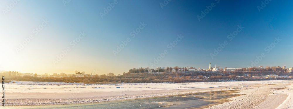 panorama of the frozen river and city on a cold winter day panorama of the frozen river and city on a cold winter day